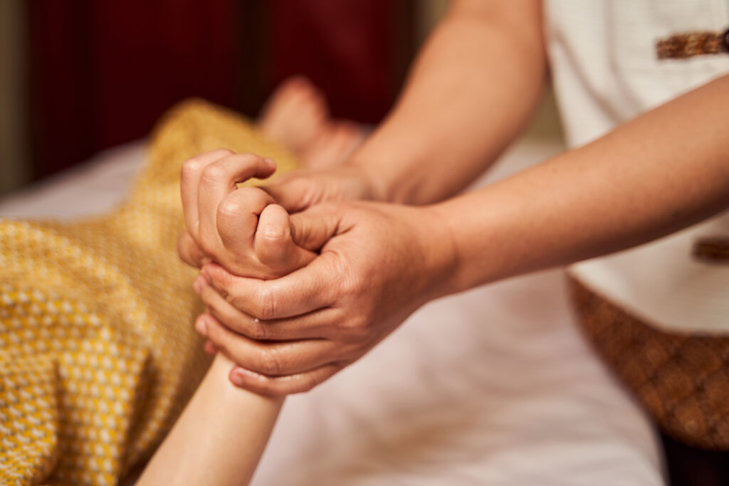 chiropractor inserting bones on hand of child 2025 03 06 01 07 14 utc